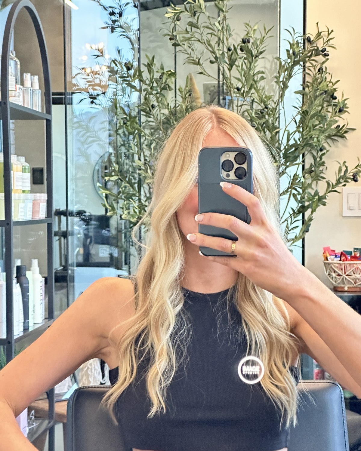 Sabrina in Beth&rsquo;s chair at the salon, where Salt and Sage&rsquo;s salon web design work began