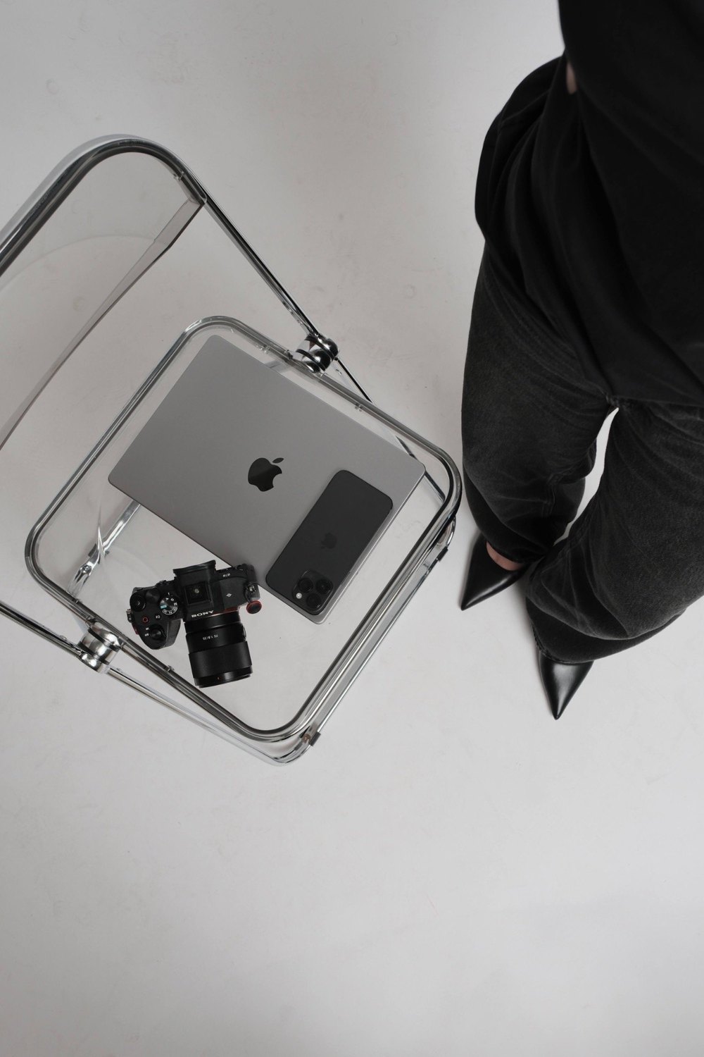 A laptop, phone, and camera laid out, the tools behind Salt and Sage website projects